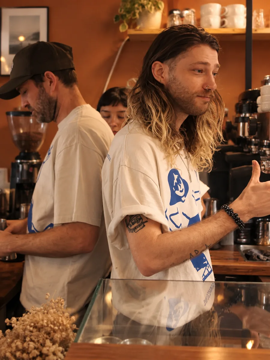 The cafe team working behind the counter